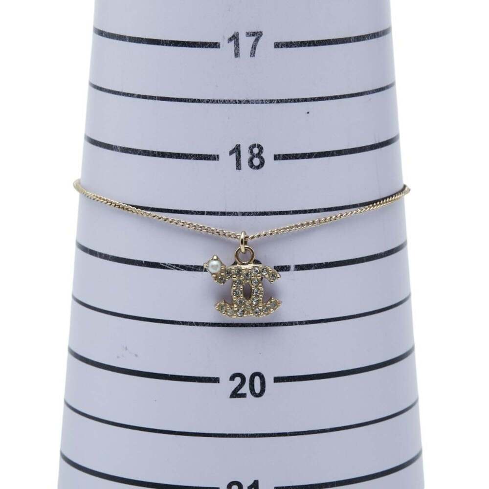 CHANEL Gold Pearl Logo Charm Bracelet - Picture 6 of 7